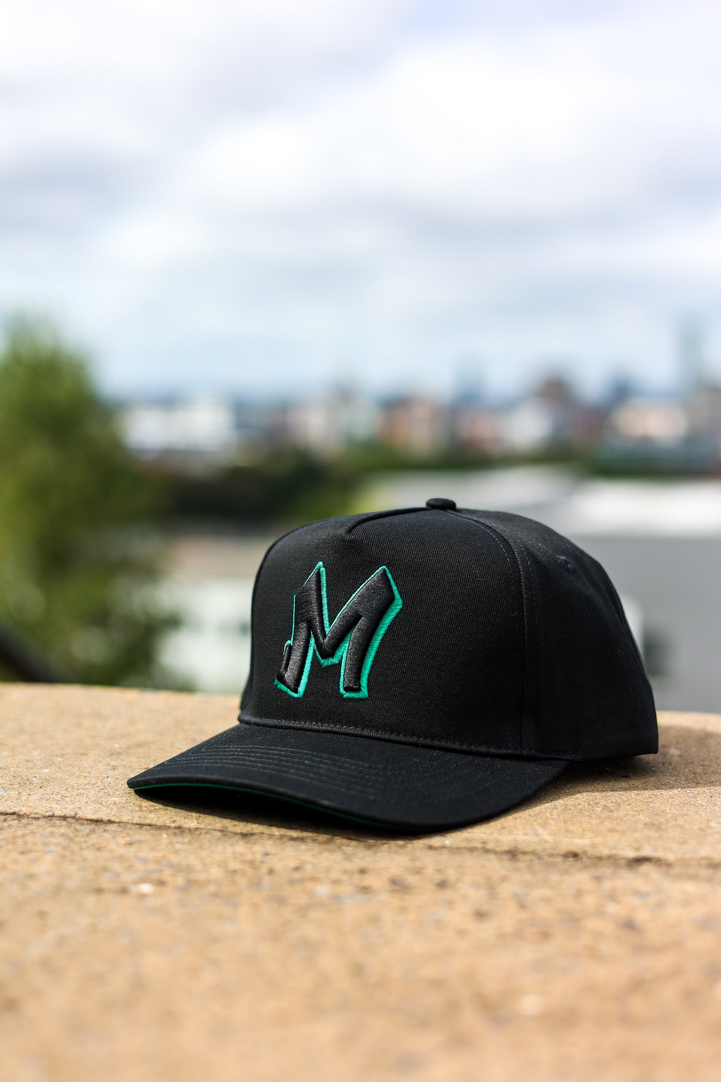 M Logo Black Cap Green Stitch Contrast